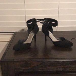 Black suede heels. Have never been worn.